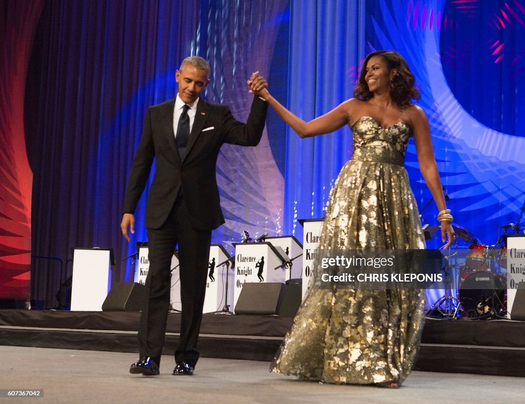 TOPSHOT-US-POLITICS-BLACK CAUCUS-OBAMA-CLINTON