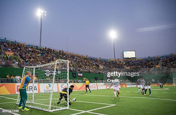 Goalkeeper Meysam Shojaeiyan IRI collects the ball after a Brazilian attack during the Men's Gold Medal Match, Brazil vs Islamic Republic of Iran....