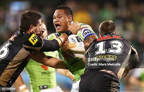 Joseph Leilua of the Raiders is tackled during the second NRL Semi Final match between the Canberra Raiders and the Penrith Panthers at GIO Stadium...