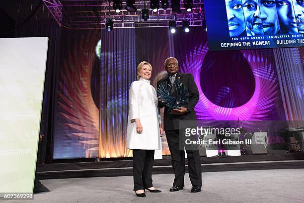Hillary Clinton receives a Phoenix Award from Congressman James Clyburn at Walter E. Washington Convention Center on September 17, 2016 in...