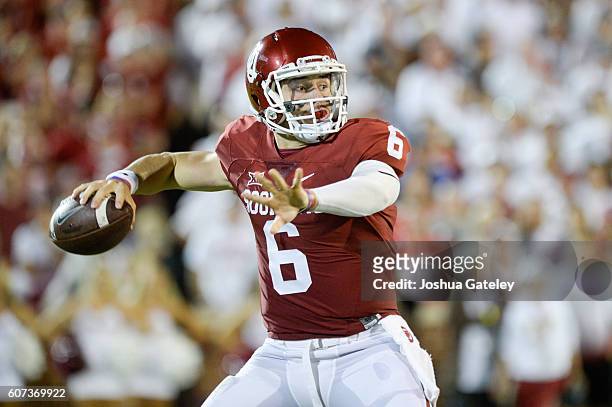 Baker Mayfield of the Oklahoma Sooners throws a pass against the Ohio State Buckeyes at Gaylord Family Oklahoma Memorial Stadium on September 17,...