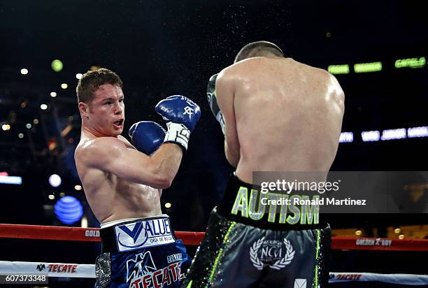 Canelo Alvarez fights Liam Smith during the WBO Junior Middleweight World bout at AT&T Stadium on September 17, 2016 in Arlington, Texas.