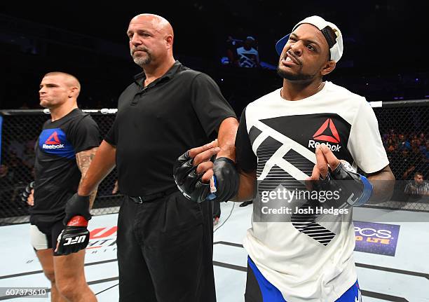 Michael Johnson celebrates his knockout victory over Dustin Poirier in their lightweight bout during the UFC Fight Night event at State Farm Arena on...