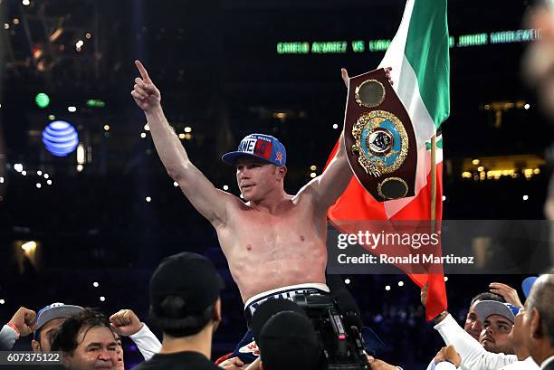 Canelo Alvarez celebrates after knocking out Liam Smith during the WBO Junior Middleweight World fight at AT&T Stadium on September 17, 2016 in...