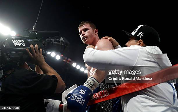 Canelo Alvarez celebrates after knocking out Liam Smith during the WBO Junior Middleweight World fight at AT&T Stadium on September 17, 2016 in...