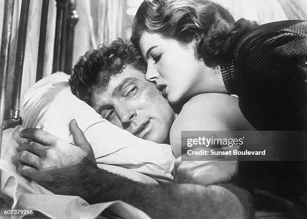 American actor Burt Lancaster and French actress Corinne Calvet on the set of Rope of Sand, directed by William Dieterle.