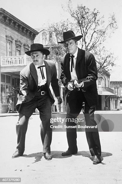American actors Kirk Douglas and Burt Lancaster on the set of Gunfight at the O.K. Corral, directed by John Sturges.