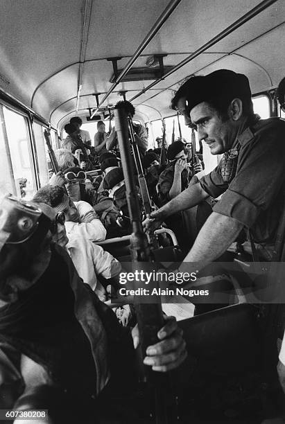 Eden Pastora, also known as Commander Zero, rides a bus with fellow Sandinista guerrillas at the end of a hijacking and hostage-taking in Managua,...