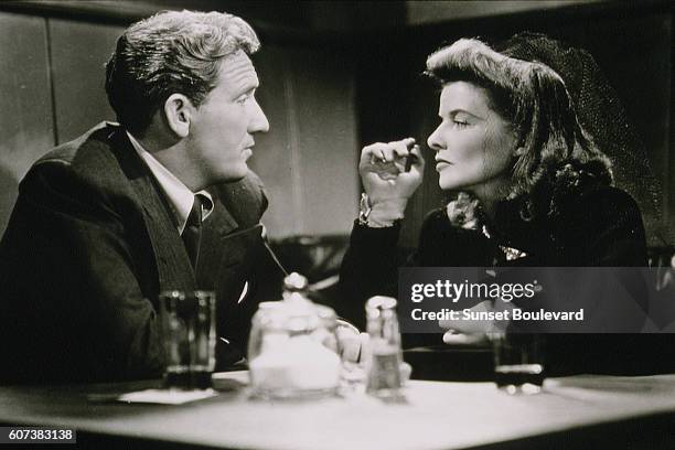 American actors Spencer Tracy and Katharine Hepburn on the set of Woman of the Year, directed by George Stevens.