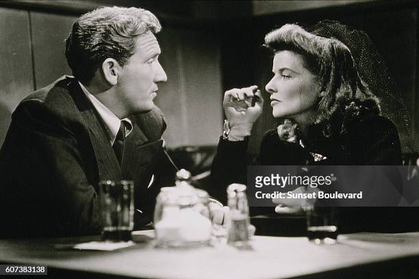 American actors Spencer Tracy and Katharine Hepburn on the set of Woman of the Year, directed by George Stevens.