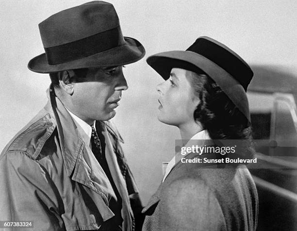 American actor Humphrey Bogart and Swedish actress Ingrid Bergman on the set of Casablanca, directed by Michael Curtiz.