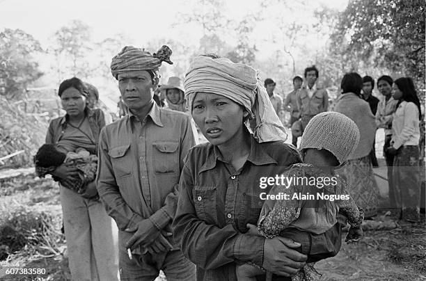 Cambodian refugees at the Red Hill refugee camp, near the Thai-Cambodian Border. 60,000 people fled to the south as fighting increased between...