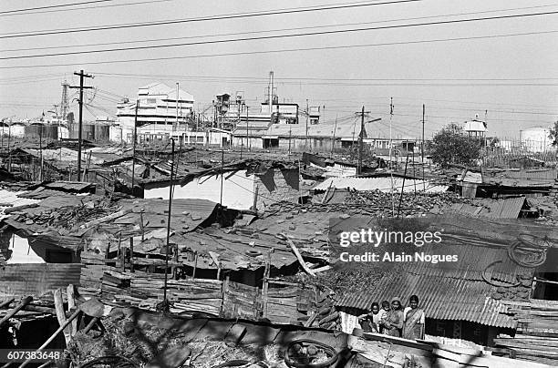 Eleven days after a cloud from the Union Carbide plant carrying methyl isocyanate gas seriously injured 20,000 people and killed 3000, the resumption...