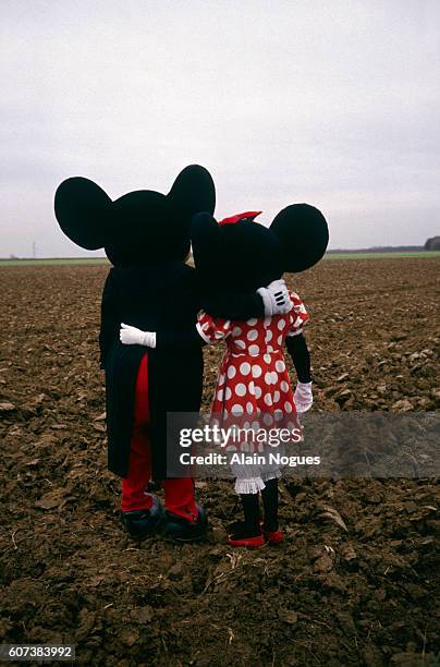 Mickey Mouse and Minnie Mouse visit the site of the future Disneyland in Marne La Vallee.