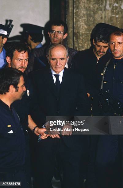 Klaus Barbie, who was the SS officer in charge of the Gestapo in Lyon, leaves the Lyon Law Courts where he has just been tried for his crimes against...