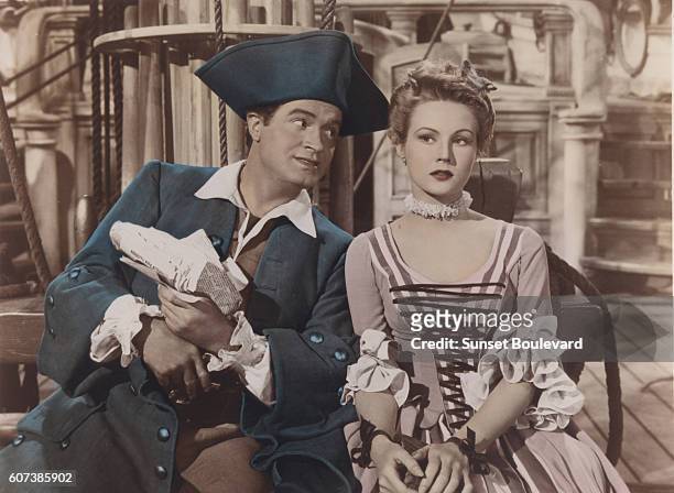 British actor Bob Hope and American actress Virginia Mayo as Sylvester the Great and Princess Margaret, on the set of The Princess and the Pirate,...