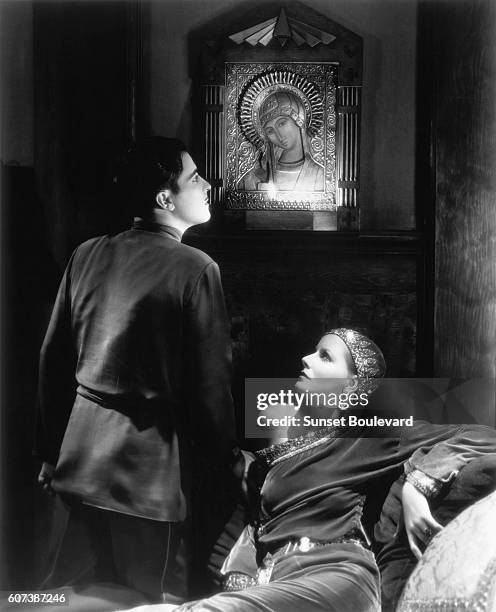 Swedish actress Greta Garbo and Mexican actor Ramon Novarro on the set of Mata Hari, directed by George Fitzmaurice.