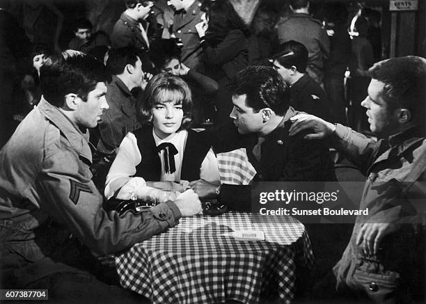 American actor George Hamilton, Austrian-born German actress Romy Schneider and American actor George Peppard on the set of The Victors, directed by...