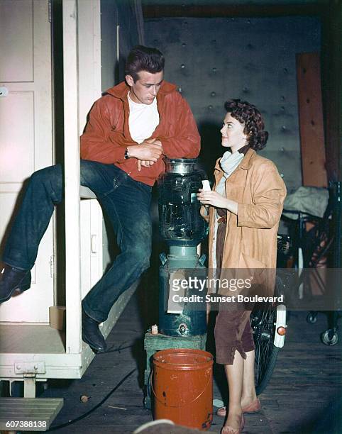 American actors James Dean and Nathalie Wood on the set of Rebel Without a Cause, directed by Nicholas Ray.