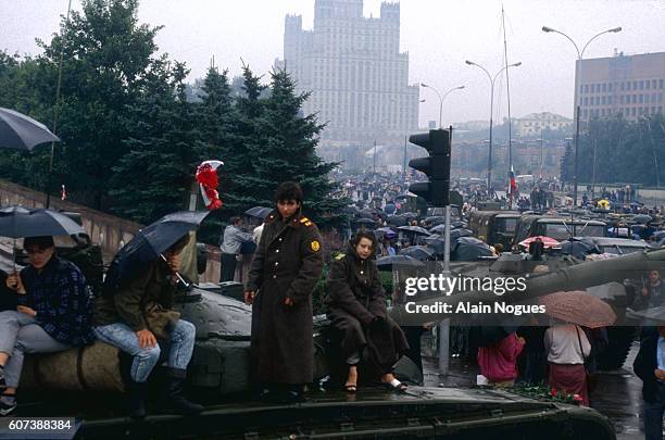 Civilians and military personnel hold a demonstration outside the Kremlin where tanks have formed a roadblock during a 1991 coup attempt. The State...