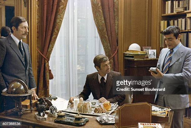 French actors Jean Paul Belmondo, Jean Rochefort and Charles Denner on the set of L'Heritier, written and directed by Philippe Labro.