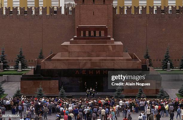 Visitors crowd around the Lenin Mausoleum a month after the failed 1991 Soviet coup. In August of 1991, Soviet hardliners attempted to overthrow...