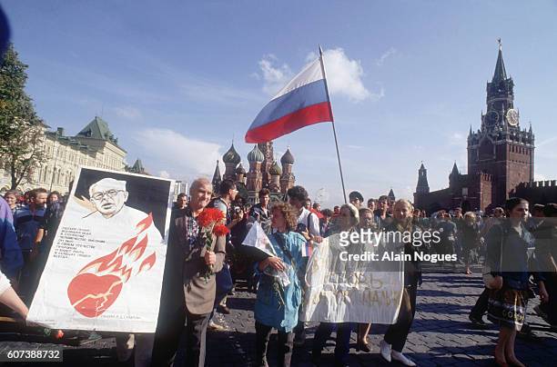 Demonstrators march in Red Square after the failed 1991 coup. On August 18 of 1991, Soviet hardliners attempted to overthrow leaders Mikhail...