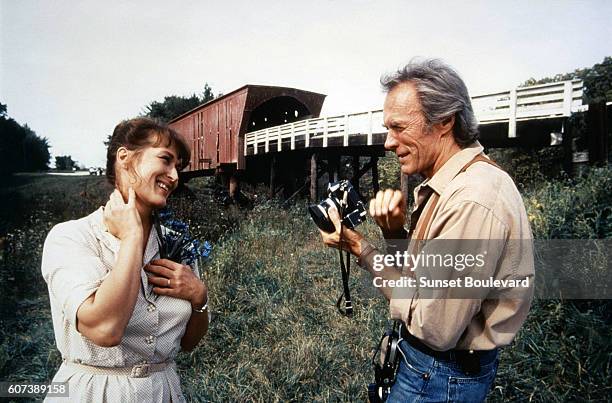 American actress Meryl Streep with actor, director and producer Clint Eastwood on the set of his movie The Bridges of Madison County.