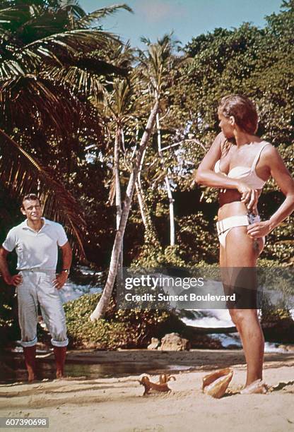 Actress Ursula Andress and actor Sean Connery on the set of "Dr No".