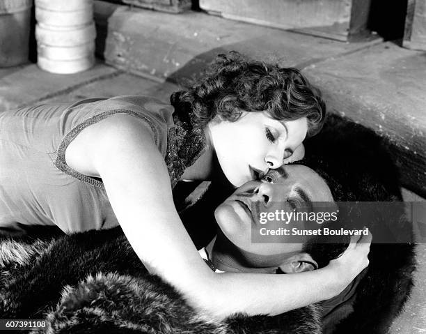 Actress Greta Garbo and actor John Gilbert on the set of "Flesh And The Devil".