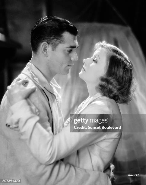 Swedish actress Greta Garbo and American actor Clark Gable on the set of Susan Lennox Fall and Rise.
