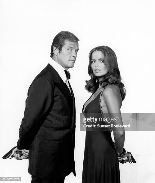 Actor Roger Moore and actress Barbara Bach on the set of "The Spy Who Love Me".
