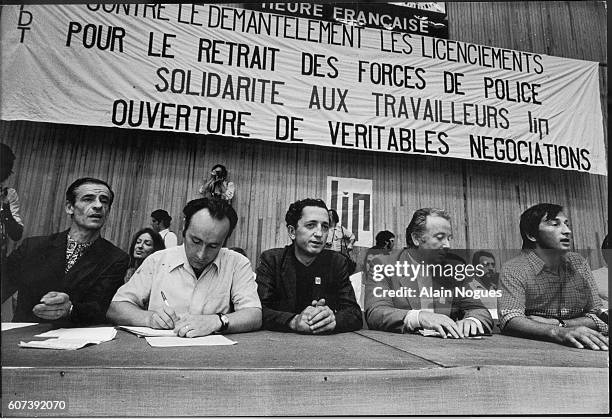 Striking workers from the LIP watch and clock factory meet at the Besancon Sports Center. Union members hold sit-ins and requisition company watches...