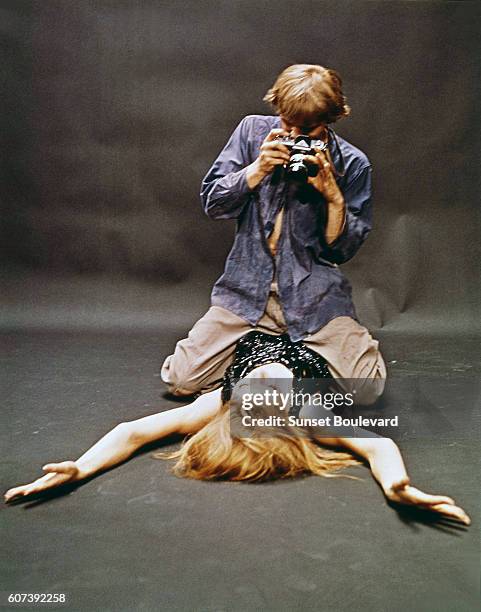British actor David Hemmings on the set of Blowup, written and directed by Michelangelo Antonioni.