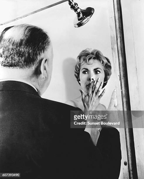 Alfred Hitchcock and Janet Leigh on the set of "Psycho", directed by Alfred Hitchcock.