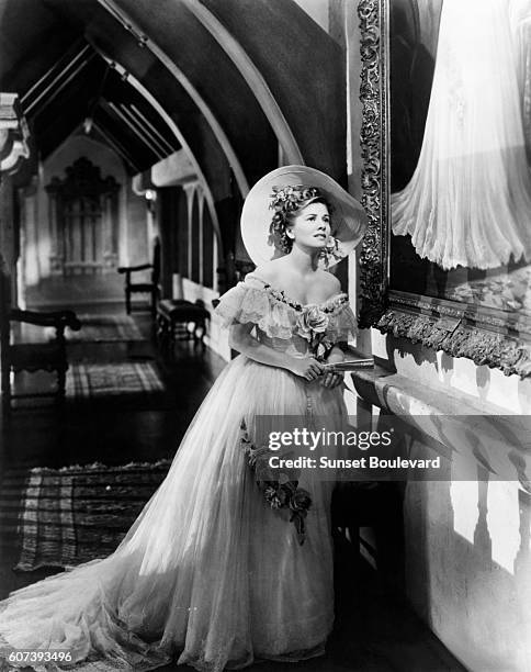 British-American Joan Fontaine on the set of Rebecca, directed by Alfred Hitchcock.