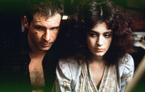 Harrison Ford and Sean Young on the set of "Blade Runner", directed by Ridley Scott.