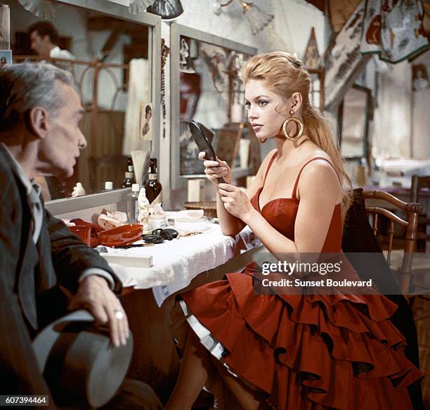 Brigitte Bardot on the set of "La Lumiere D'en Face" .