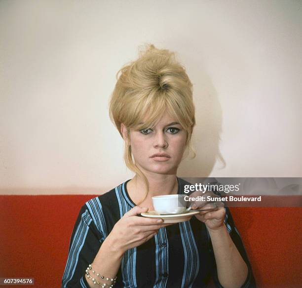 Brigitte Bardot on the set of "Le Mepris" .