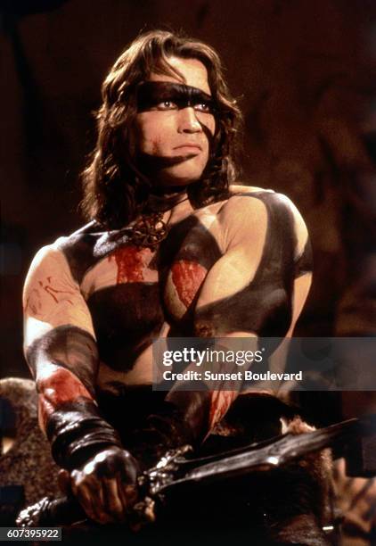 Austrian-born American actor Arnold Schwarzenegger on the set of Conan the Barbarian, directed by John Milius.