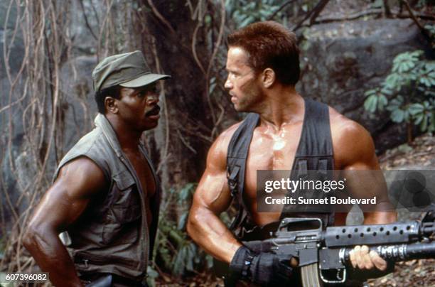 Carl Weathers and Arnold Schwarzenegger on the set of "Predator".