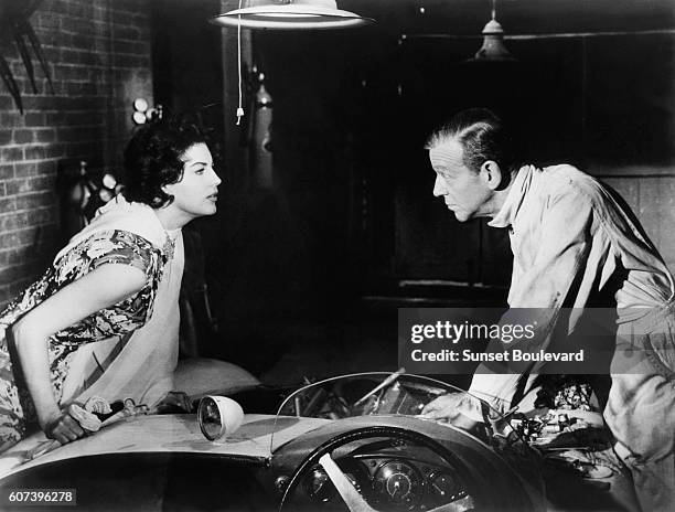 American actors Ava Gardner and Fred Astaire on the set of On the Beach, directed by Stanley Kramer.