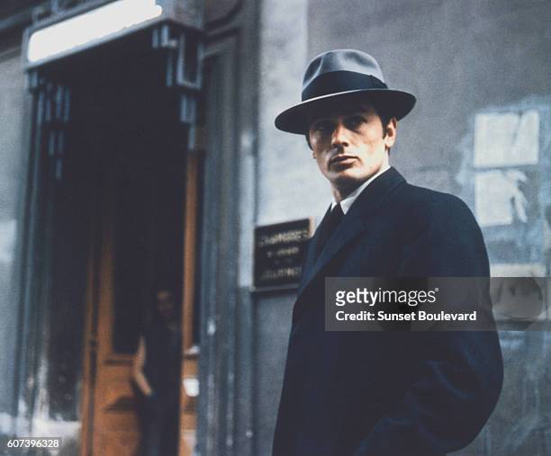 French actor Alain Delon on the set of Le Samourai, written and directed by Jean-Pierre Melville.