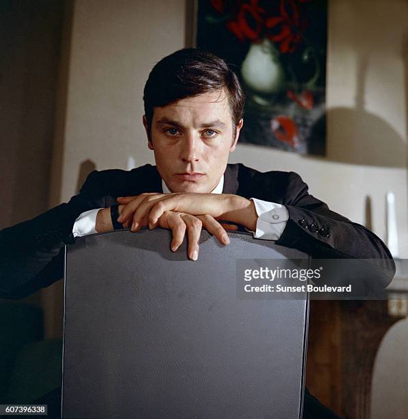 French actor Alain Delon on the set of Le Samourai, written and directed by Jean-Pierre Melville.