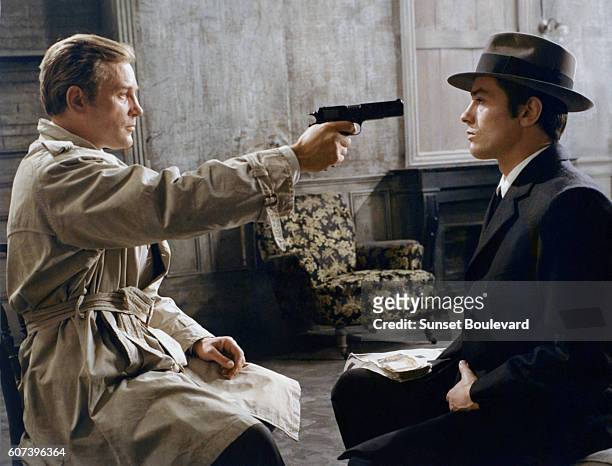 French actors Jacques Leroy and Alain Delon on the set of Le Samourai, written and directed by Jean-Pierre Melville.