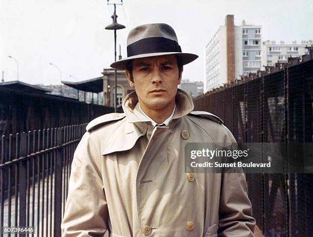 French actor Alain Delon on the set of Le Samourai, written and directed by Jean-Pierre Melville.