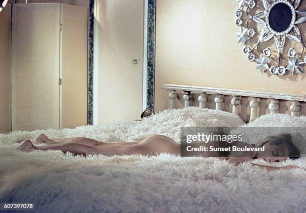 Austrian-born German actress Romy Schneider on the set of La Piscine, directed by Jacques Deray.