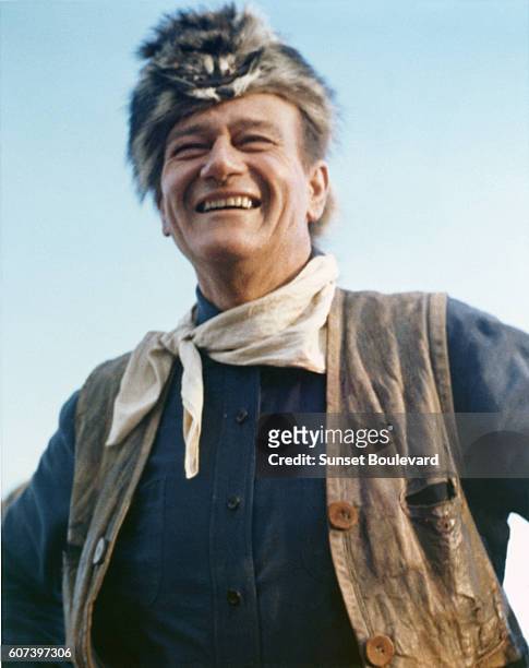 American actor and director John Wayne on the set of his movie The Alamo.