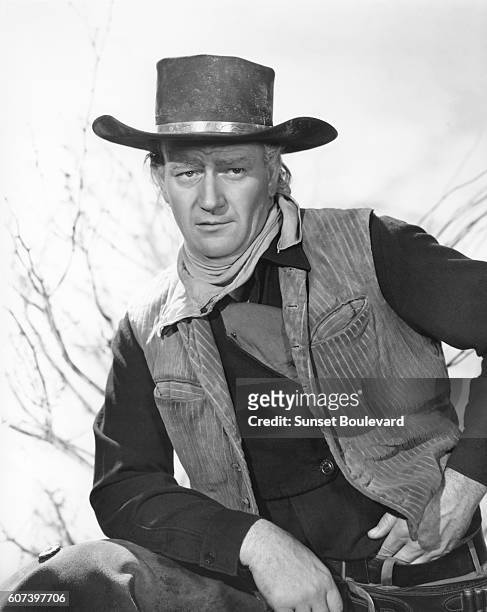 American actor John Wayne on the set of Red River, directed by Howard Hawks and Arthur Rosson.