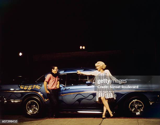 Charles Martin Smith and Candy Clark on the set of "American Graffiti".